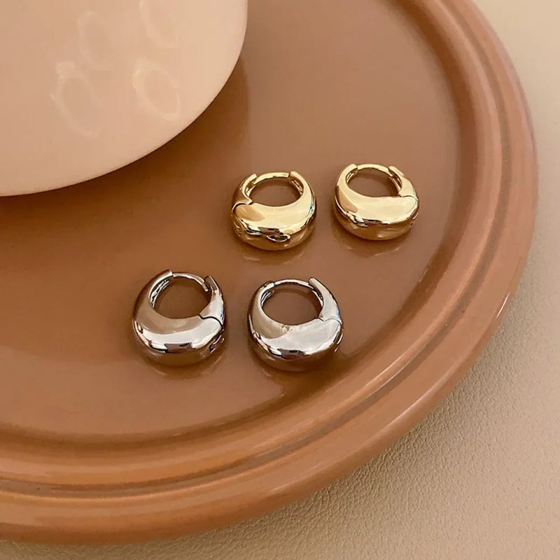 Argolas Grossas – Brilho Intenso em Aço Inoxidável